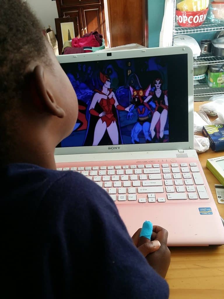 Sir Twizzler watching She-Ra and He-Man while wearing the Thumbow custom thumb tape