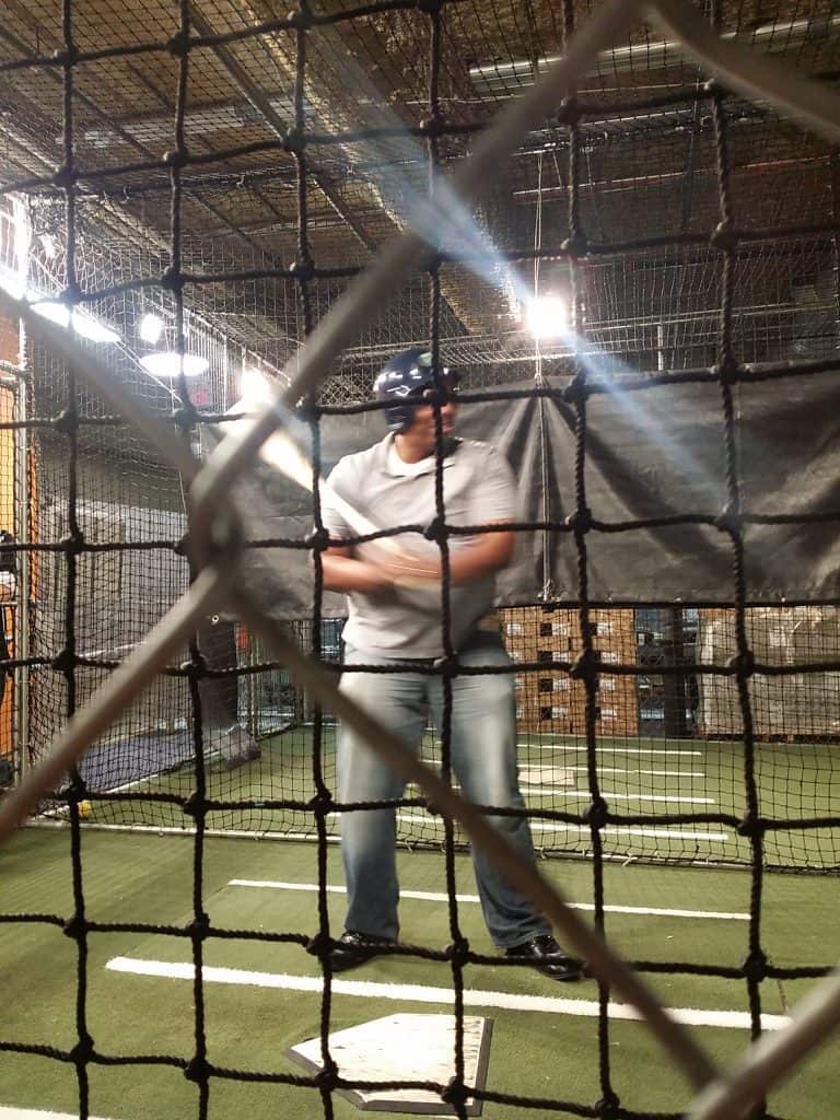 Taking a swing in the batting cages at Louisville Slugger Museum and Factory