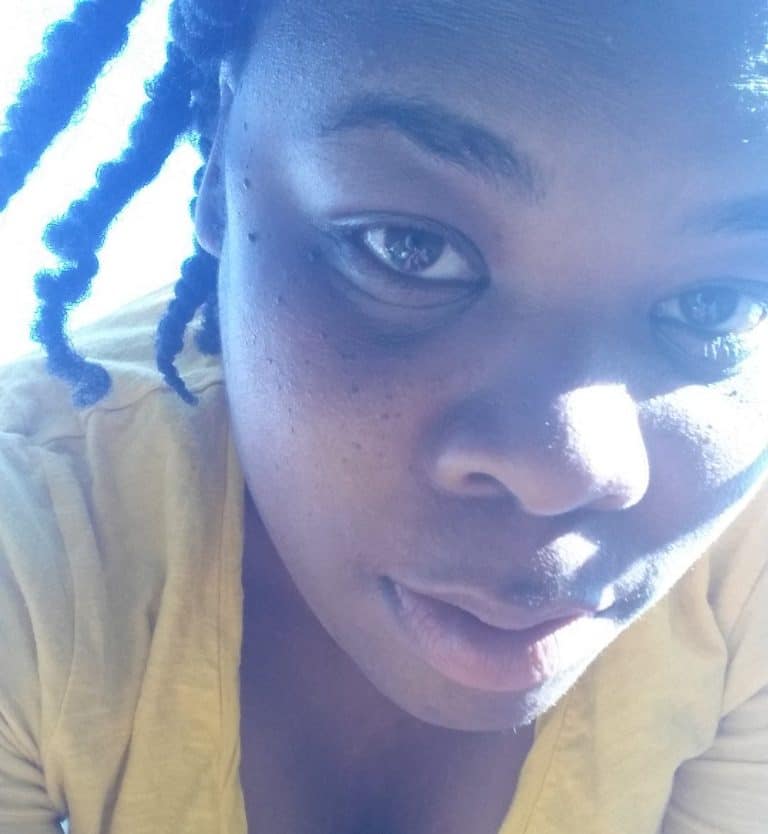 Natasha Nicholes of Houseful of Nicholes taking a break from gardening