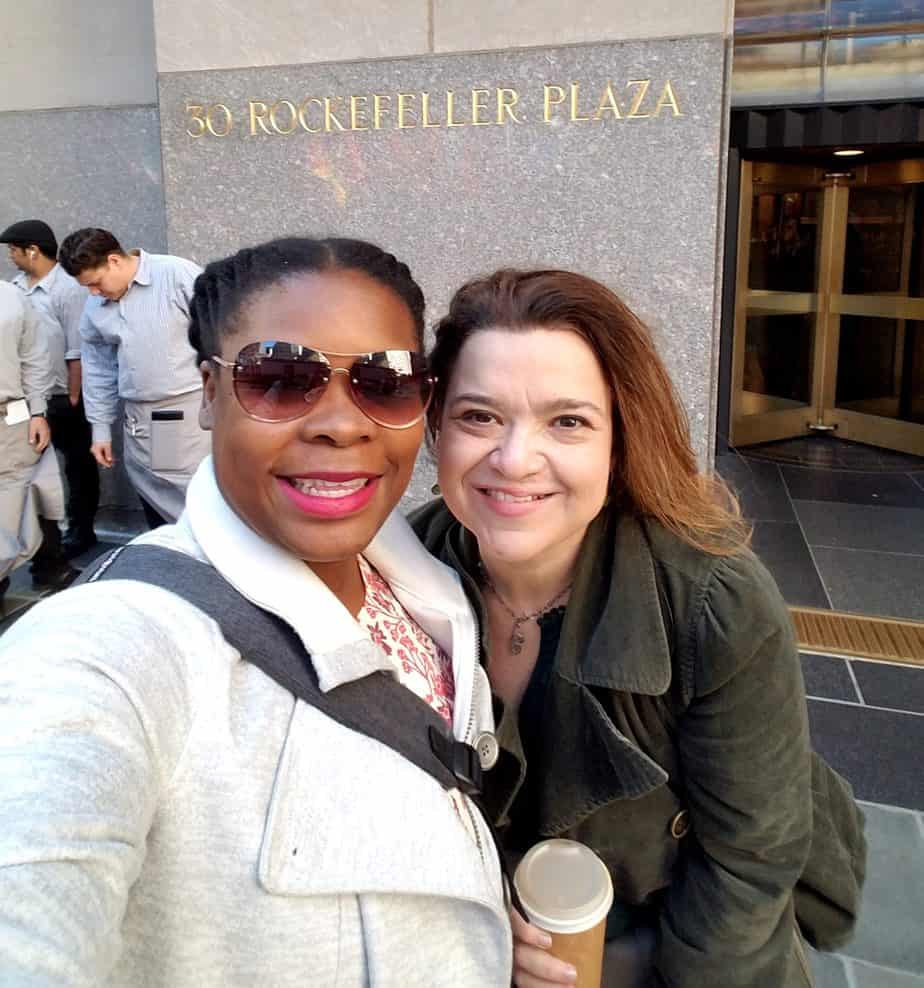 Natasha Nicholes from Houseful of Nicholes and Laurie White from Mom 2.0 standing in front of Rockefeller Plaza in New York City 
