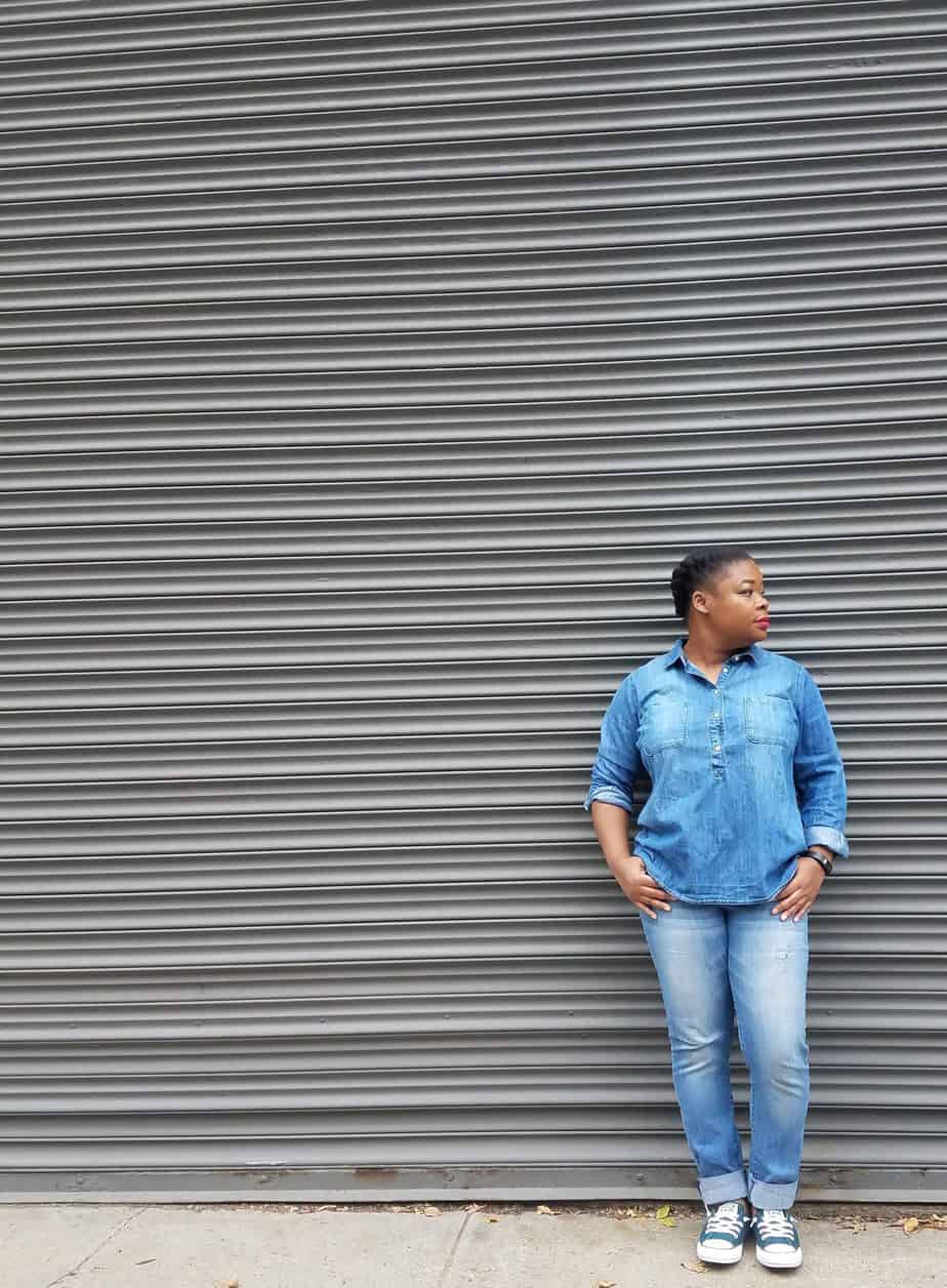 Natasha Nicholes from Houseful of Nicholes in front of Airbnb storefront