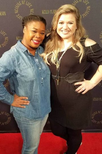 Natasha Nicholes and Kelly Clarkson discussing Clarkson's new album, Meaning of Life