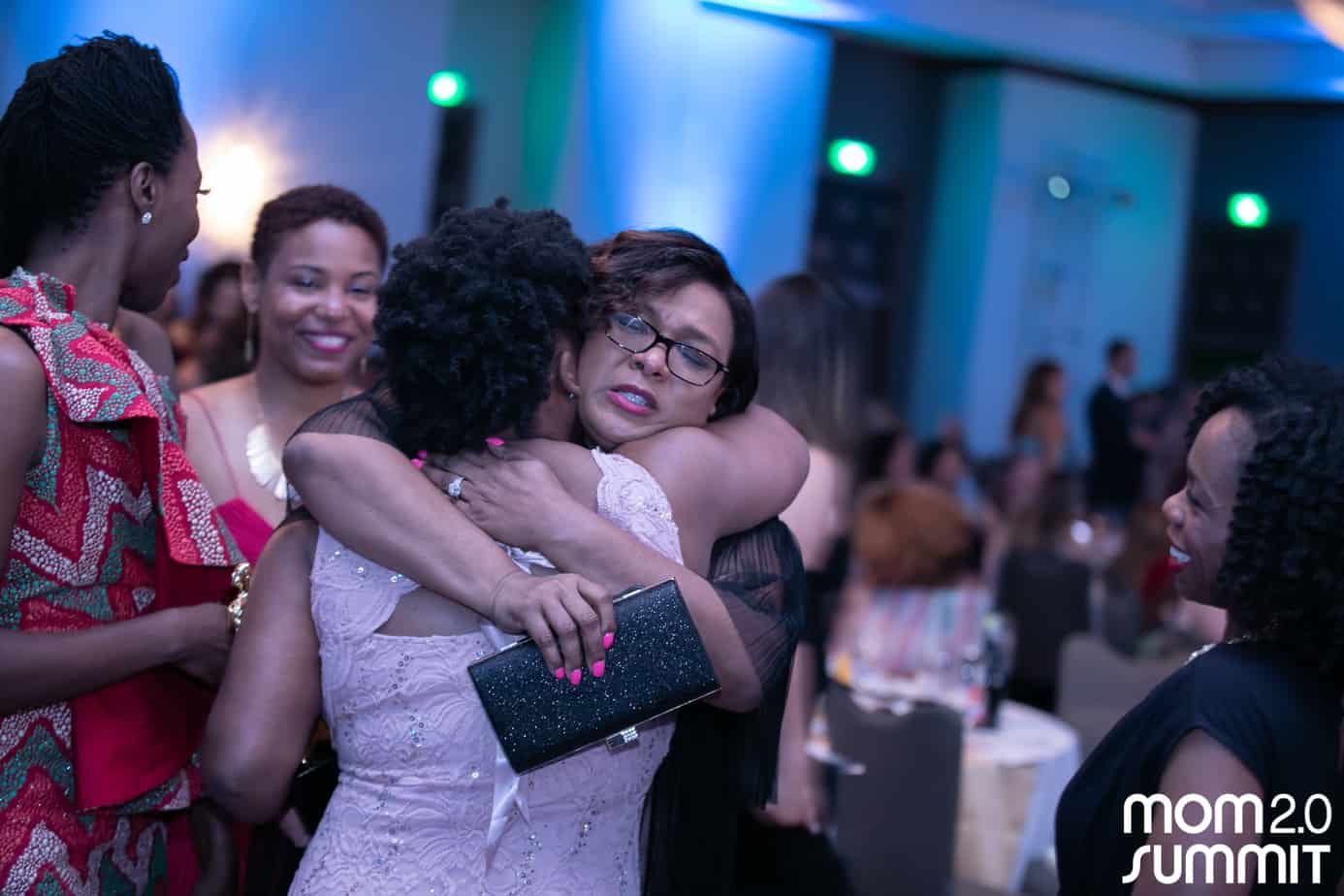 Natasha Nicholes hugging Latoyia Dennis