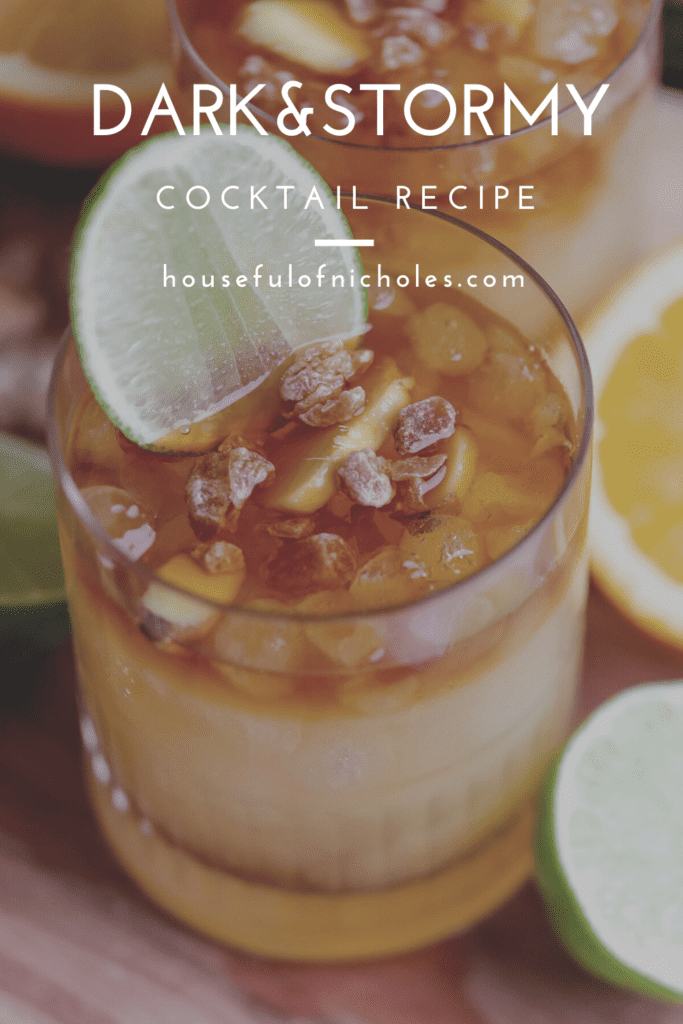 Dark and Stormy Cocktail photo - rock glass filled with ginger beer, simple syrup, rum, orange and lime juices. 