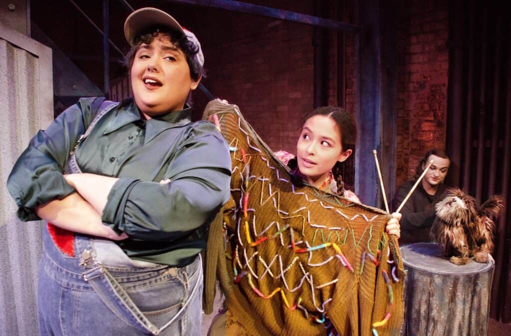 Amanda de la Guardia as Nate, Shea Lee as Annabelle, and Bradley Halverson as Mars; in Lifeline
Theatre’s “Extra Yarn”, adapted by Jessica Wright Buha, music by John Szymanski, directed by Anthony
Kayer, a world premiere musical based on the book by Marc Barnet, illustrated by John Klassen;
previews begin Saturday, February 18, 2023, Opening Sunday, February 19, and running through
Sunday, March 19. Lifeline Theatre is located at 6912 N. Glenwood Ave. Chicago, IL 60626. For tickets
visit www.lifelinetheatre.com or call the box office at 773-761-4477.